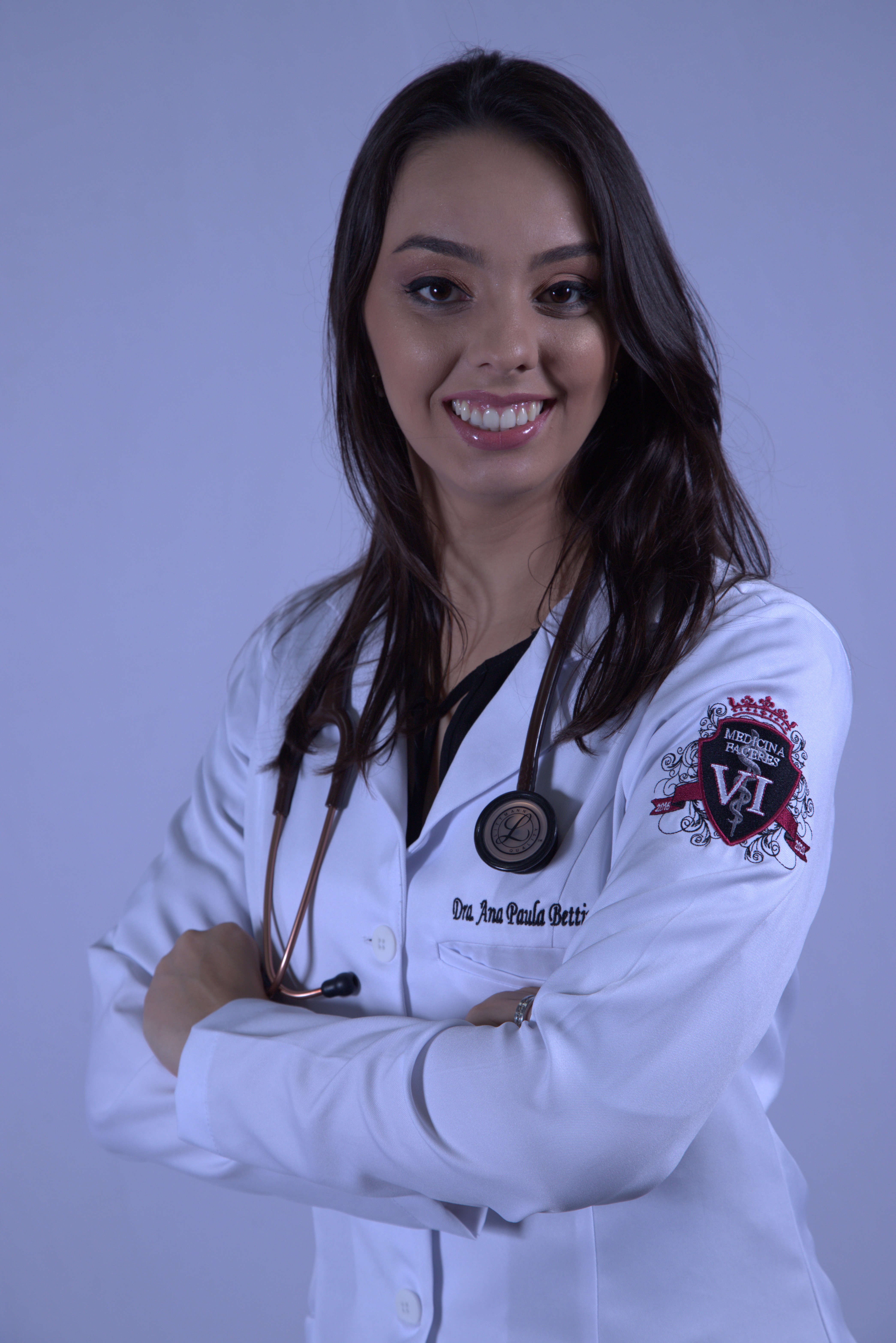 Foto da Dra. Ana Paula Bettini em atendimento